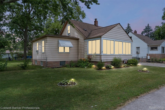 22355 Curie Ave, Warren, MI 48091 - view of front facade featuring a fire pit and roof with shingles