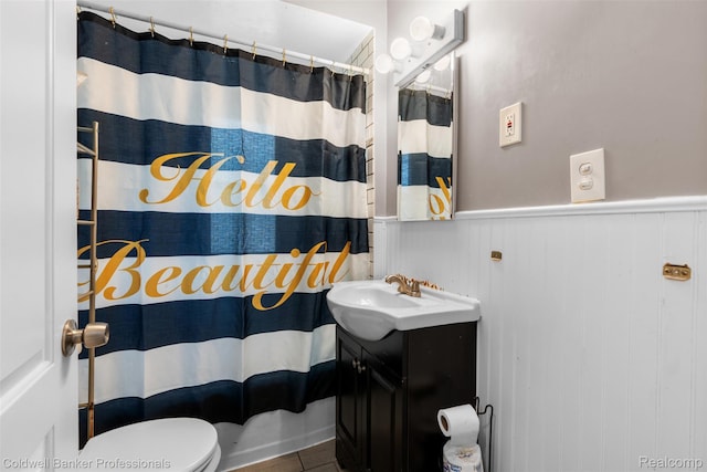 22355 Curie Ave, Warren, MI 48091 - full bath with vanity, wainscoting, a shower with shower curtain, and tile patterned floors