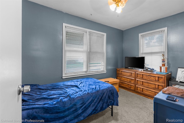 22355 Curie Ave, Warren, MI 48091 - bedroom featuring carpet, multiple windows, and a ceiling fan