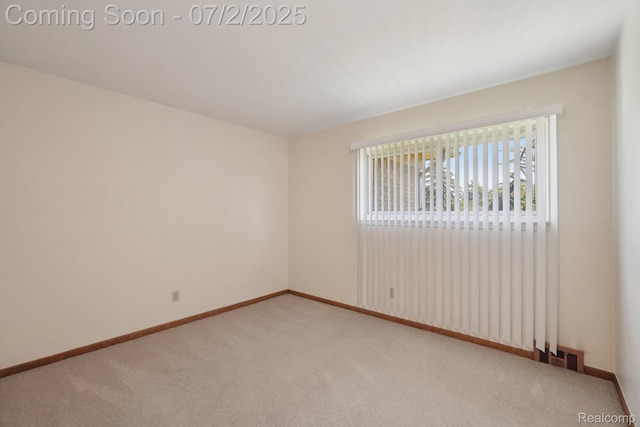 54829 Starlite Dr, Shelby Twp, MI 48316 - unfurnished room with light carpet and baseboards