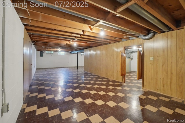 54829 Starlite Dr, Shelby Twp, MI 48316 - basement with tile patterned floors and wood walls