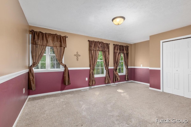 3268 Michele Ln, Hamilton, MI 49419 - spare room with carpet floors and a textured ceiling