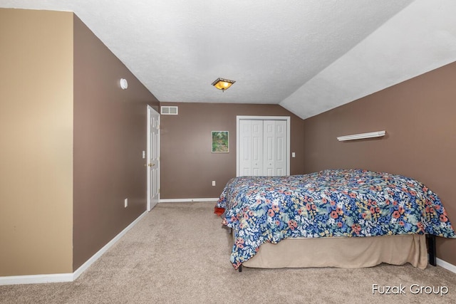 3268 Michele Ln, Hamilton, MI 49419 - carpeted bedroom featuring a closet and vaulted ceiling