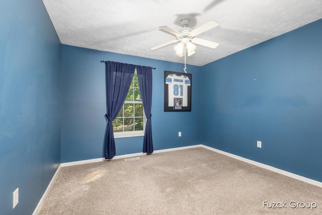 3268 Michele Ln, Hamilton, MI 49419 - empty room featuring carpet floors, a textured ceiling, and ceiling fan