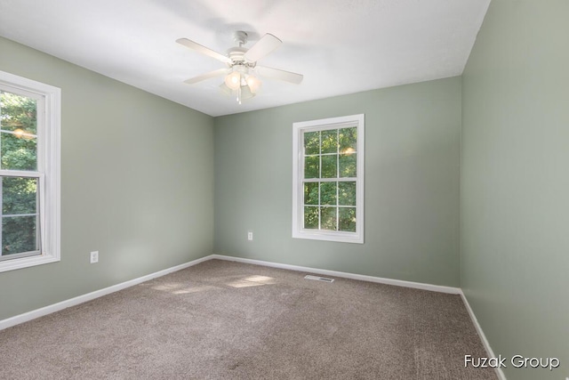 3268 Michele Ln, Hamilton, MI 49419 - unfurnished room featuring carpet flooring and a ceiling fan