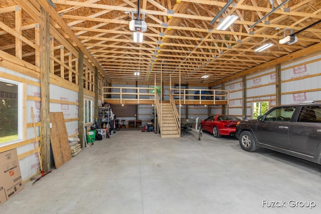 3268 Michele Ln, Hamilton, MI 49419 - garage featuring a garage door opener