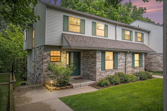 3841 Greenleaf Cir, Kalamazoo, MI 49008 - view of front of home featuring roof with shingles and stone siding