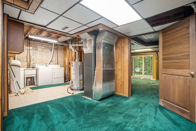 3841 Greenleaf Cir, Kalamazoo, MI 49008 - below grade area featuring gas water heater, separate washer and dryer, heating unit, carpet flooring, and a water softener system