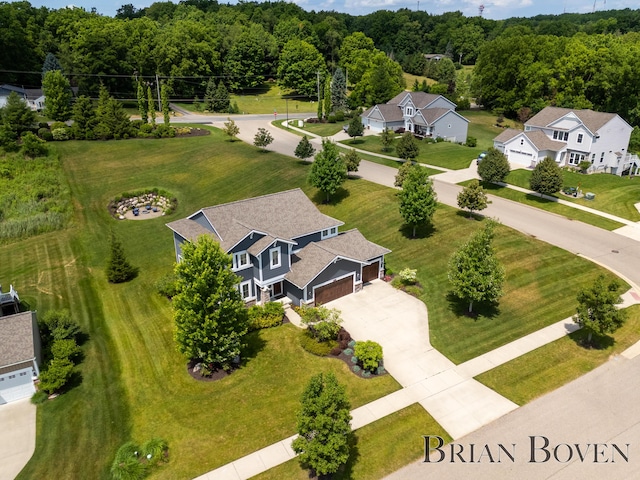 9633 Waterstone Dr, Byron Center, MI 49315 - drone / aerial view of a heavily wooded area