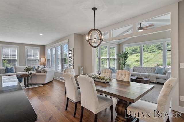 9633 Waterstone Dr, Byron Center, MI 49315 - dining area featuring healthy amount of natural light, wood finished floors, a chandelier, recessed lighting, and vaulted ceiling