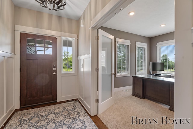 9633 Waterstone Dr, Byron Center, MI 49315 - foyer featuring wood finished floors, recessed lighting, and a chandelier