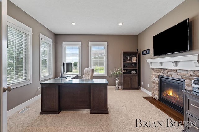 9633 Waterstone Dr, Byron Center, MI 49315 - office featuring light carpet, a fireplace, and recessed lighting