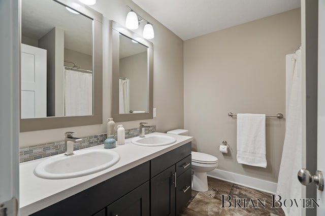 9633 Waterstone Dr, Byron Center, MI 49315 - full bathroom with double vanity and toilet