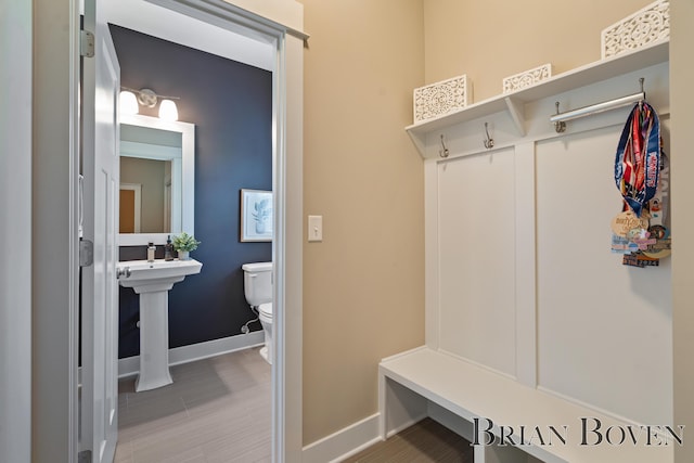 9633 Waterstone Dr, Byron Center, MI 49315 - mudroom with baseboards