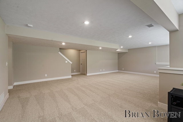 9633 Waterstone Dr, Byron Center, MI 49315 - finished basement featuring light colored carpet and recessed lighting