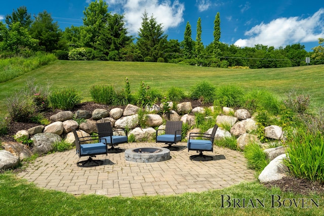 9633 Waterstone Dr, Byron Center, MI 49315 - view of patio / terrace with a fire pit