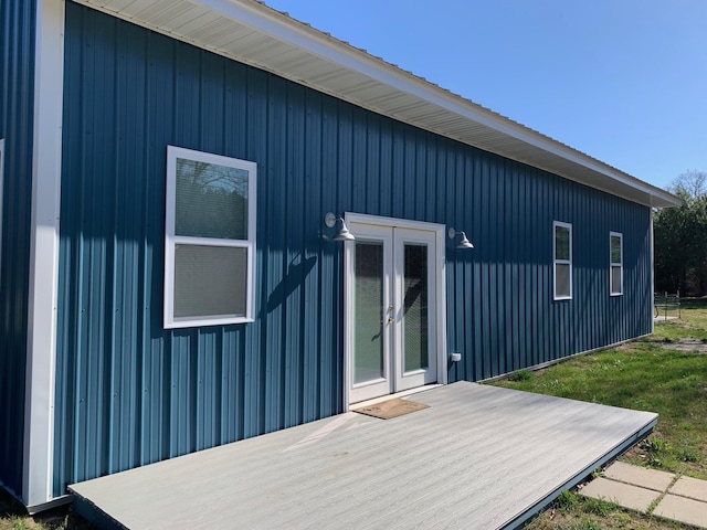 4969 N Highbridge Rd, Brethren, MI 49619 - back of house featuring french doors and a wooden deck