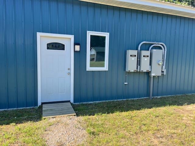 4969 N Highbridge Rd, Brethren, MI 49619 - property entrance featuring a yard