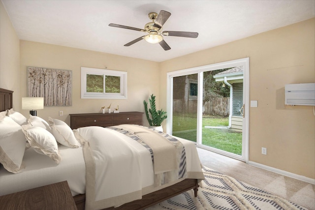 1233 Craft Ave, Kalamazoo, MI 49048 - bedroom featuring access to outside, an AC wall unit, light carpet, and a ceiling fan