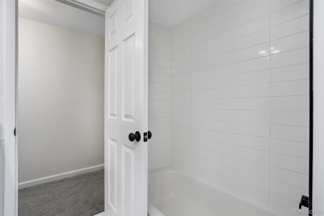 684 Abbey Ct, Rochester Hills, MI 48307 - full bathroom with bathing tub / shower combination and baseboards
