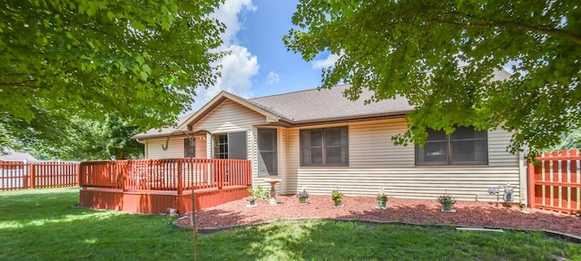 215 W State St, Coldwater, MI 49036 - view of front of property featuring a wooden deck and a fenced backyard