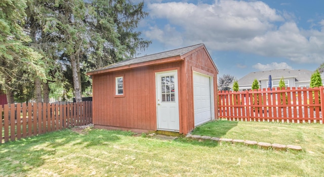 215 W State St, Coldwater, MI 49036 - view of outdoor structure featuring a fenced backyard