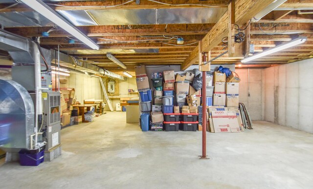 215 W State St, Coldwater, MI 49036 - unfinished below grade area with electric panel and heating unit