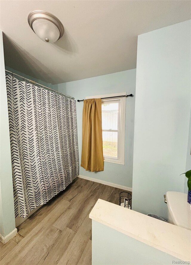 104 Park Ave, Yale, MI 48097 - bathroom featuring wood finished floors and toilet