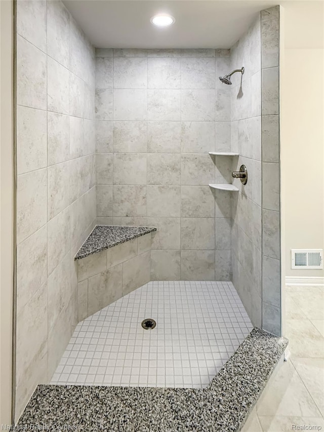 253 Devonshire Dr Unit 2, Lapeer, MI 48446 - full bathroom featuring a tile shower and recessed lighting