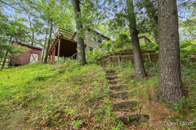 7985 Island View Dr, Newaygo, MI 49337 - view of yard with an outbuilding and a wooden deck