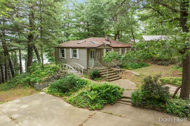 7985 Island View Dr, Newaygo, MI 49337 - view of front of property with a chimney