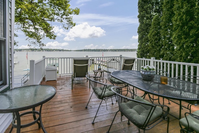 68534 Hill St, Sturgis, MI 49091 - wooden deck featuring outdoor dining space and a water view