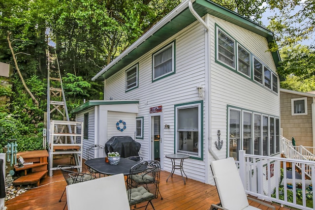 68534 Hill St, Sturgis, MI 49091 - wooden deck with area for grilling and outdoor dining area