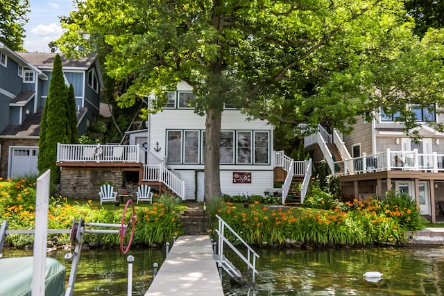 68534 Hill St, Sturgis, MI 49091 - back of property featuring stairway and a deck with water view