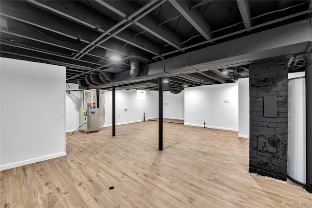 134 W Auburn Rd, Rochester, MI 48307 - finished basement featuring wood finished floors and heating unit