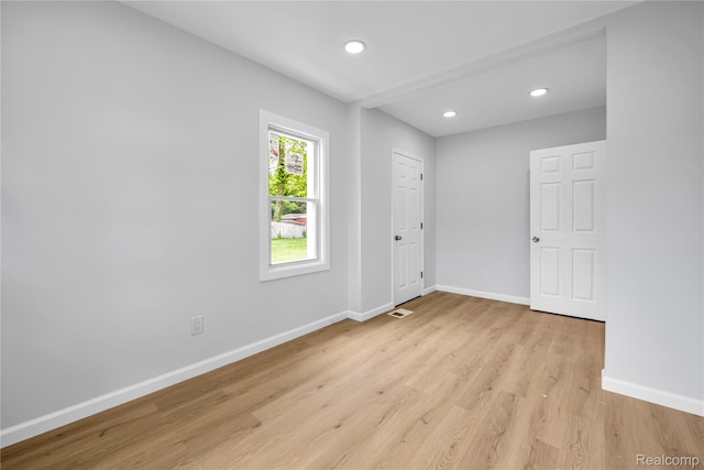 134 W Auburn Rd, Rochester, MI 48307 - empty room with light wood finished floors and recessed lighting