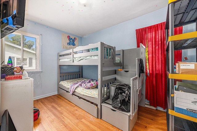 1556 Mullins Ave NW, Grand Rapids, MI 49534 - bedroom with wood finished floors
