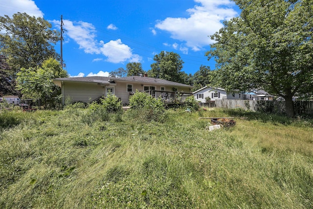 1556 Mullins Ave NW, Grand Rapids, MI 49534 - view of yard with a deck