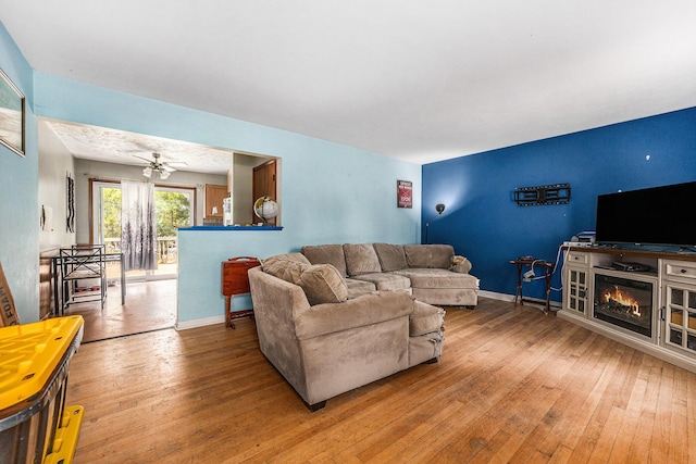 1556 Mullins Ave NW, Grand Rapids, MI 49534 - living area with light wood-type flooring and baseboards