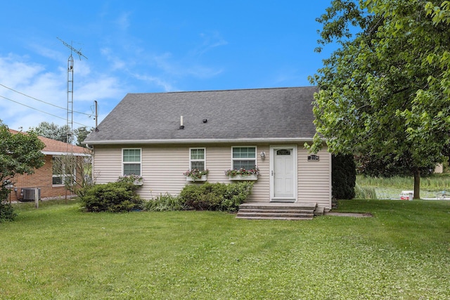 210 Oak Grove Dr, Brooklyn, MI 49230 - rear view of house featuring a yard and a shingled roof