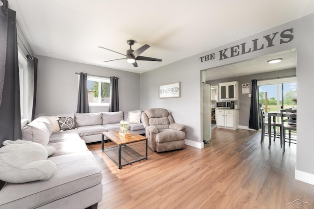 14079 Elms Rd, Montrose, MI 48457 - living room with wood finished floors and a ceiling fan