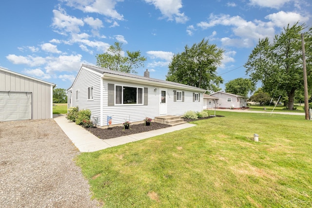 14079 Elms Rd, Montrose, MI 48457 - view of front of property featuring a chimney, a front lawn, driveway, a garage, and an outbuilding