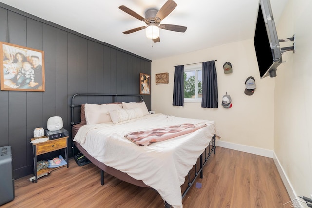 14079 Elms Rd, Montrose, MI 48457 - bedroom with light wood-style floors and a ceiling fan