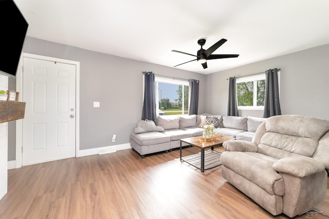 14079 Elms Rd, Montrose, MI 48457 - living area with ceiling fan and light wood finished floors