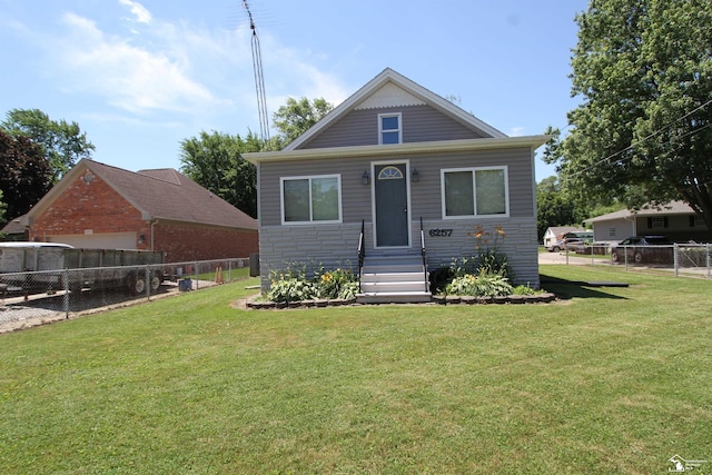 6257 E Dunbar Rd, Monroe, MI 48161 - bungalow featuring entry steps and stone siding