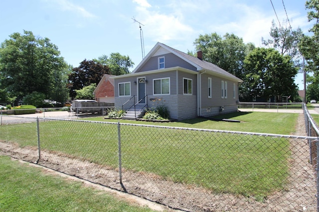 6257 E Dunbar Rd, Monroe, MI 48161 - bungalow with a fenced backyard and a chimney
