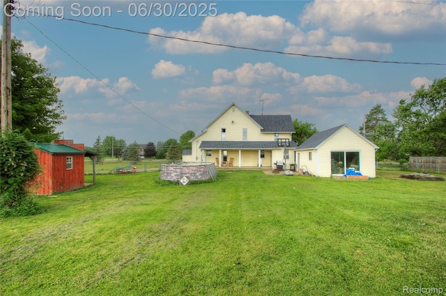 3092 Dillon Rd, Flushing, MI 48433 - back of house with a storage shed