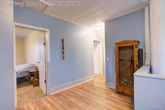 3092 Dillon Rd, Flushing, MI 48433 - hallway with wood finished floors and ornamental molding