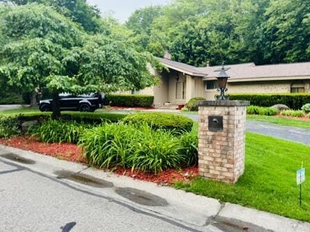 28902 Creek Bend Dr, Farmington Hills, MI 48331 - view of front of house featuring a front lawn