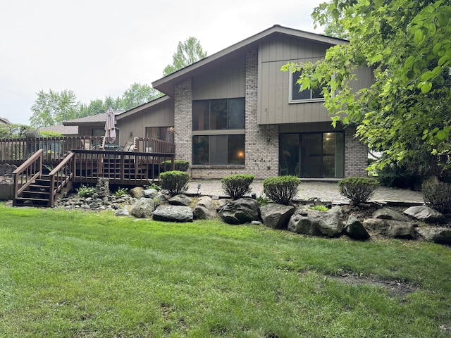 28902 Creek Bend Dr, Farmington Hills, MI 48331 - back of property featuring brick siding, a deck, and a yard